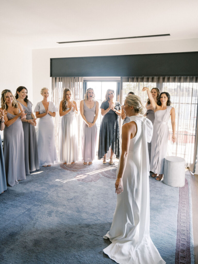 bride and bridesmaids reveal first look wedding day 