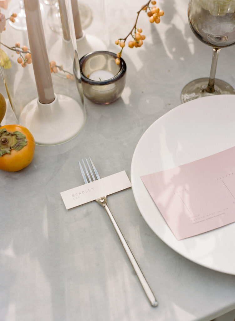 Minimal silver flatware for NYC wedding with white coupe plate
