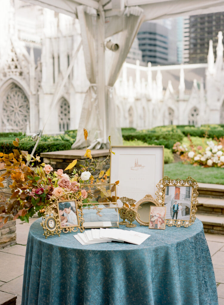 Wedding welcome table inspired by a painting at NYC rooftop wedding venue 620 Loft & Garden 