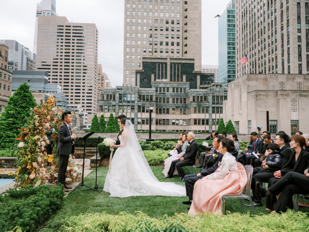 Wedding ceremony at 620 Loft & Garden on midtown rooftop 