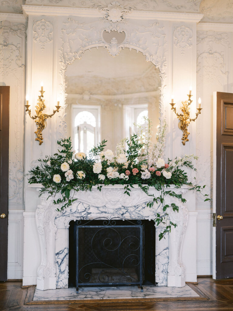 fireplace mantle at cylburn arboretum mansion with florals by sophie felts 