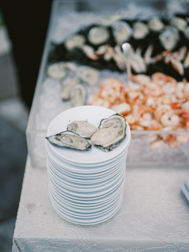raw bar oysters and shrimp at cocktail hour wedding 