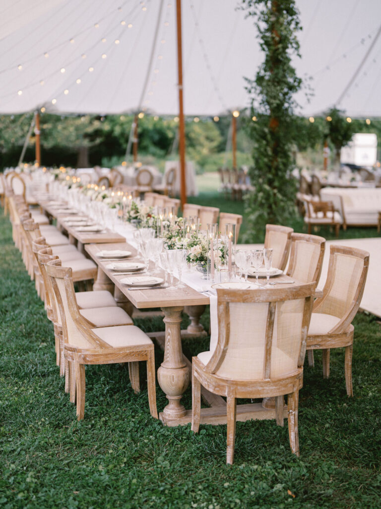 long head table with wood chairs and farm table designed by best baltimore wedding planner 