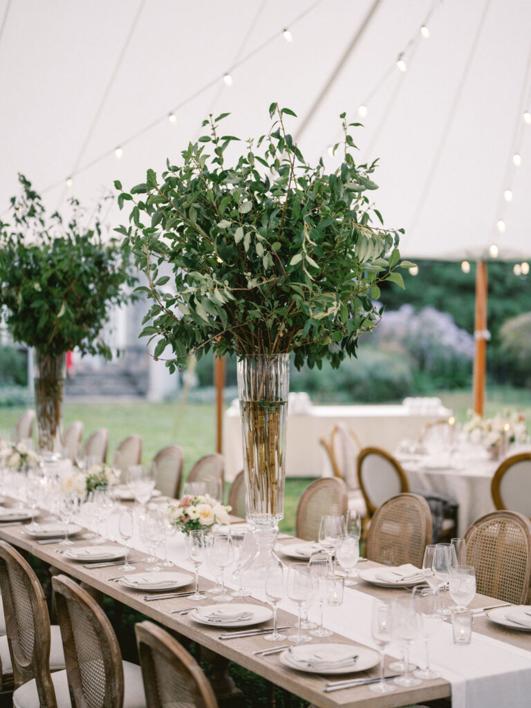 olive branch greenery centerpiece at baltimore outdoor tented wedding 