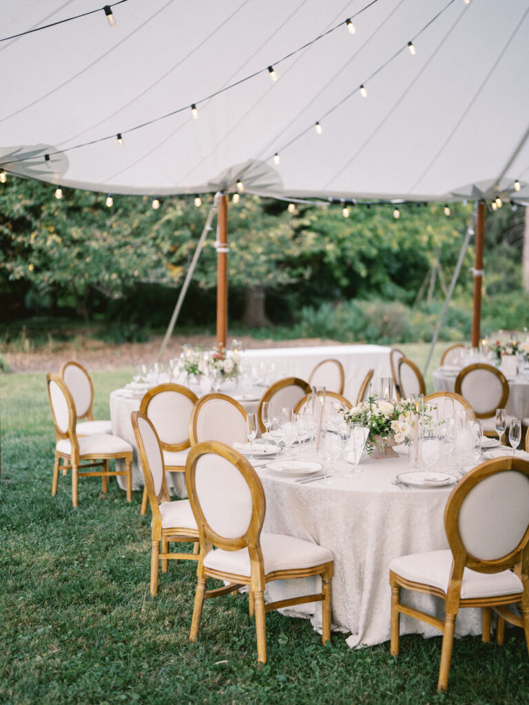 outdoor tented wedding reception neutral in sailcloth tent at cylburn arboretum in baltimore designed by wedding planner east made co 