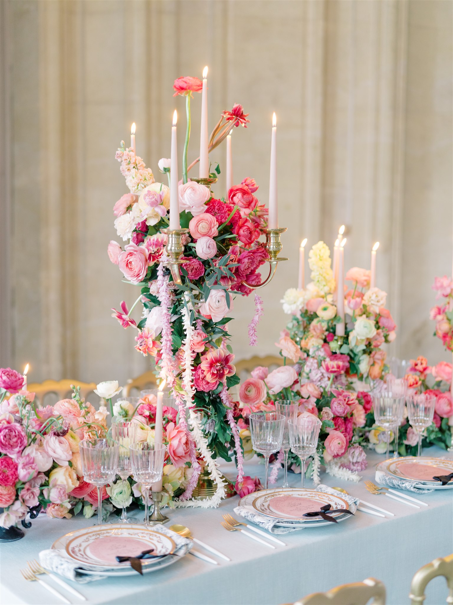 Pink floral tablescape with candelabra at Château de Champlâtreux Paris wedding venue