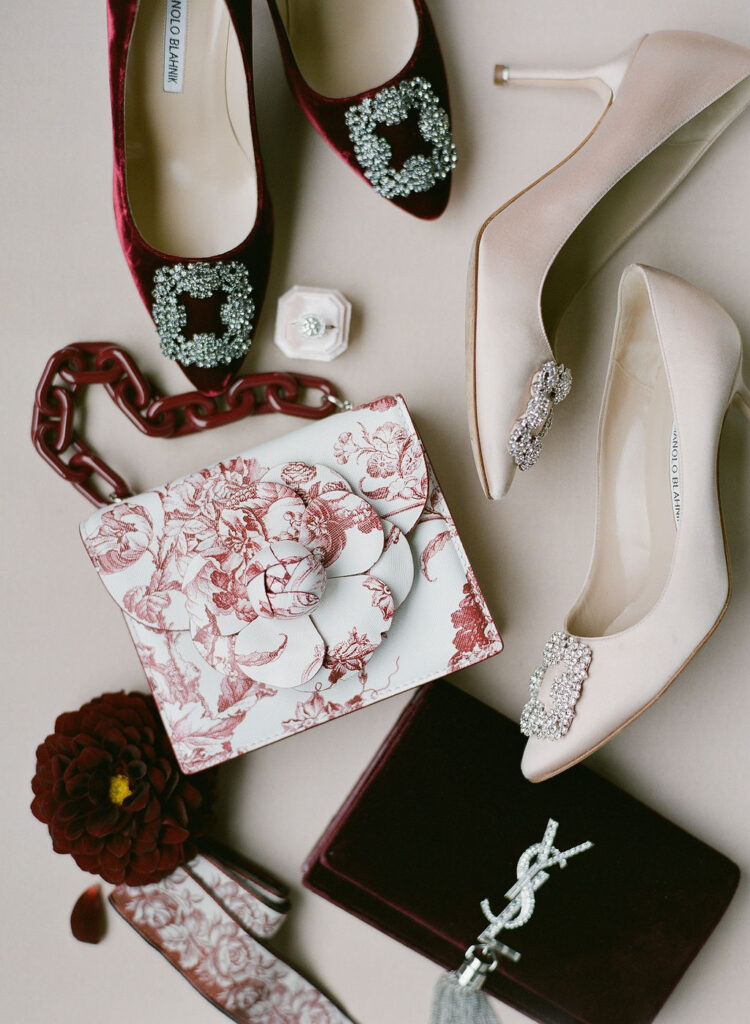 bridal shoes and clutch purses dior manolo blahnik ysl flatlay styling nyc wedding designer 