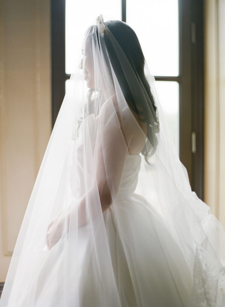 bride and veil portrait by greg finck french luxury wedding photographer paris 