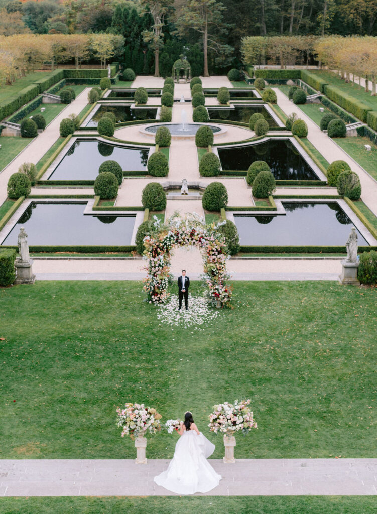 iconic bride and groom first look photo at oheka castle wedding long island premiere wedding venue new york wedding planner 