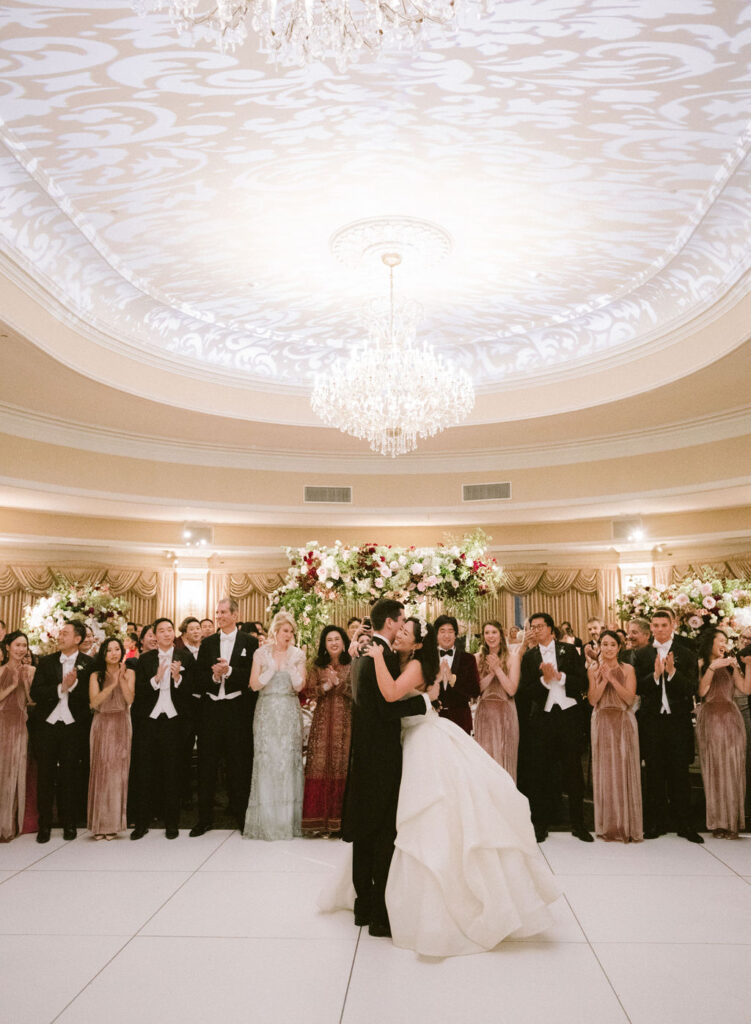 first dance under textured ceiling lighting wash in ballroom at oheka castle wedding designed by luxury nyc wedding planner east made co 