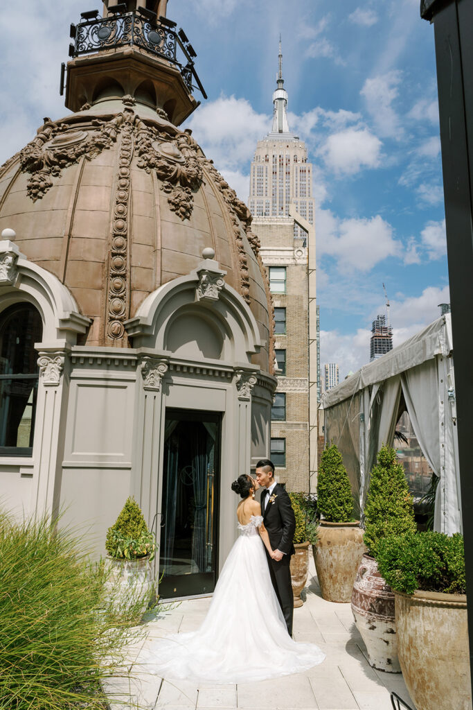 first look bride and groom in front of portico in nyc